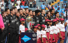 New Zealand stand for the National anthem during the ICC Men's Cricket World Cup 2023 match between South Africa and New Zealand