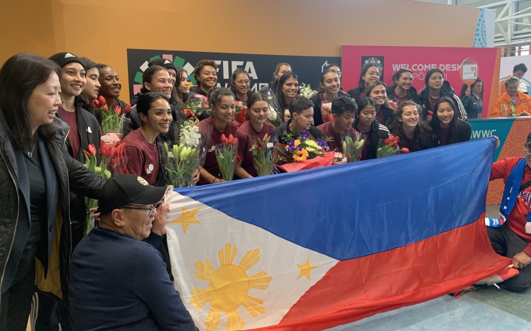 The Phillipines team arrive for FIFA Football World Cup, and take photos with fans.