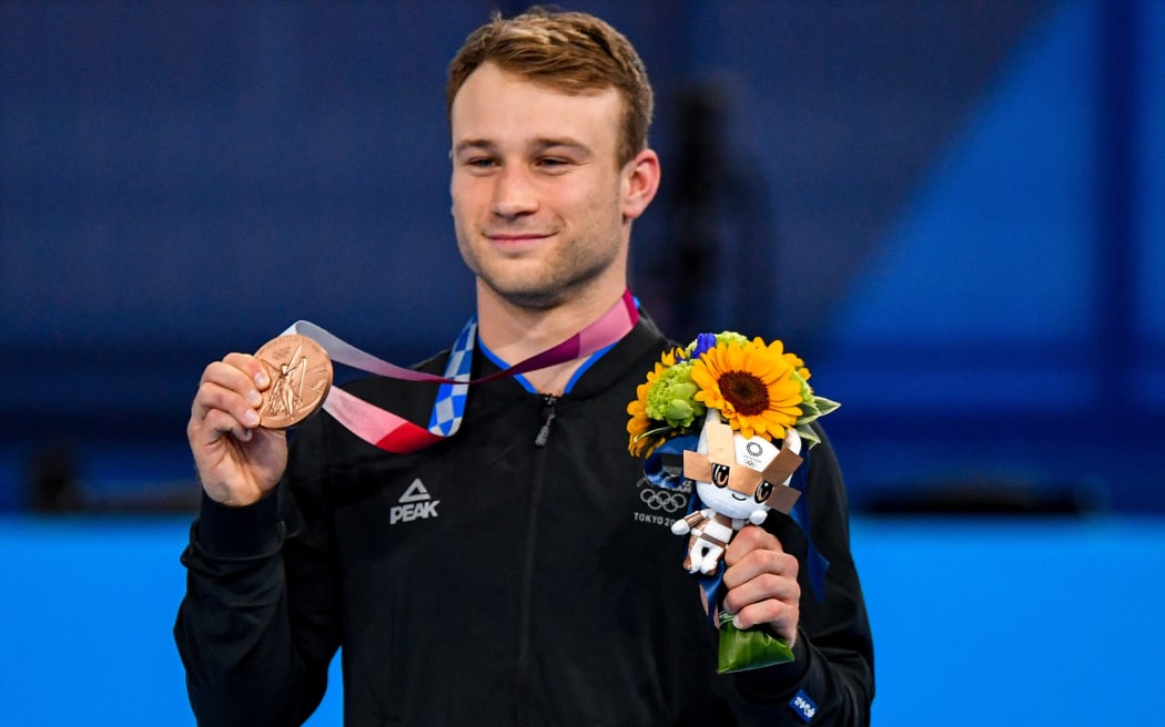 Dylan Schmidt with his bronze medal at Tokyo 2020 Olympic Games Trampoline Gymnastics at the Ariake Gymnastics Centre. Tokyo, Japan, Saturday 31 July 2021.