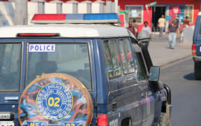 A police landcruiser patrols the streets of the Papua New Guinea capital Port Moresby.