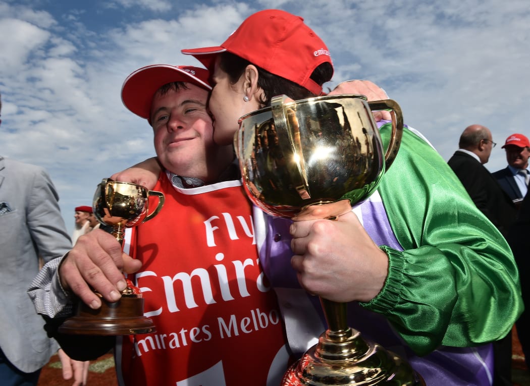 Steven (left) and Michelle Payne celebrate after Michelle rode Prince of Penzance to victory in the Melbourne Cup at Flemington Racecourse in Melbourne, Tuesday, Nov. 3, 2015.