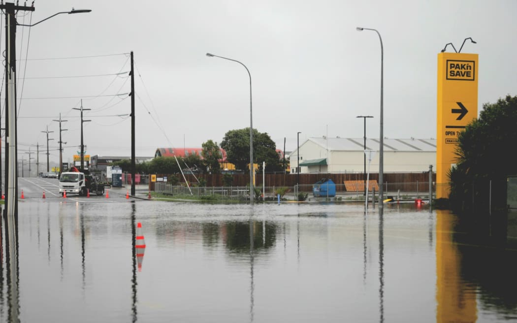Flooding on Porana Road outside Pak'nSave, Wairau, 1 February 2023.