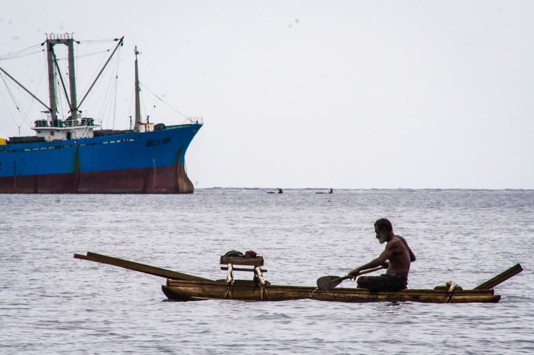 Large-scale and small-scale fishing in the waters off Madang in Papua New Guinea.