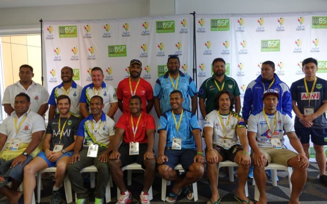 The coaches, captains and referees for the rugby league nines at the Pacific Games in PNG.