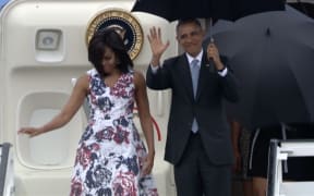 US President Barack Obama and First Lady Michelle Obama arrive March 20, 2016 in Havana, Cuba.