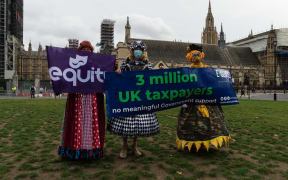 Pantomime dames in colourful costumes gather in Parliament Square after marching through central London to highlight the plight of the live events industry, on 30 September 2020 in London, England.