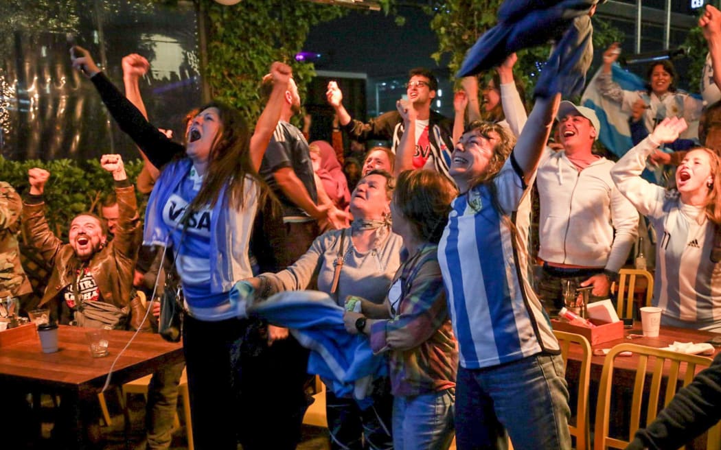 Argentina fans in Christchurch cheer Angel Di Maria's goal, the second for Argentina in the FIFA World Cup 2022 final against France, 19 December 2022.