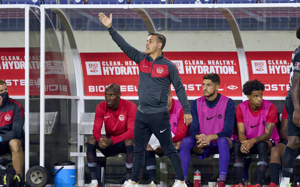 :Canada Head Coach John Herdman reacts to a play during a CONCACAF World Cup qualifying match between the United States and Canada on September 5, 2021 .