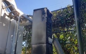 A burnt 5G cellphone tower.