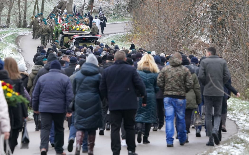 Polish villagers bury man killed in blast near Ukrainian border | RNZ News