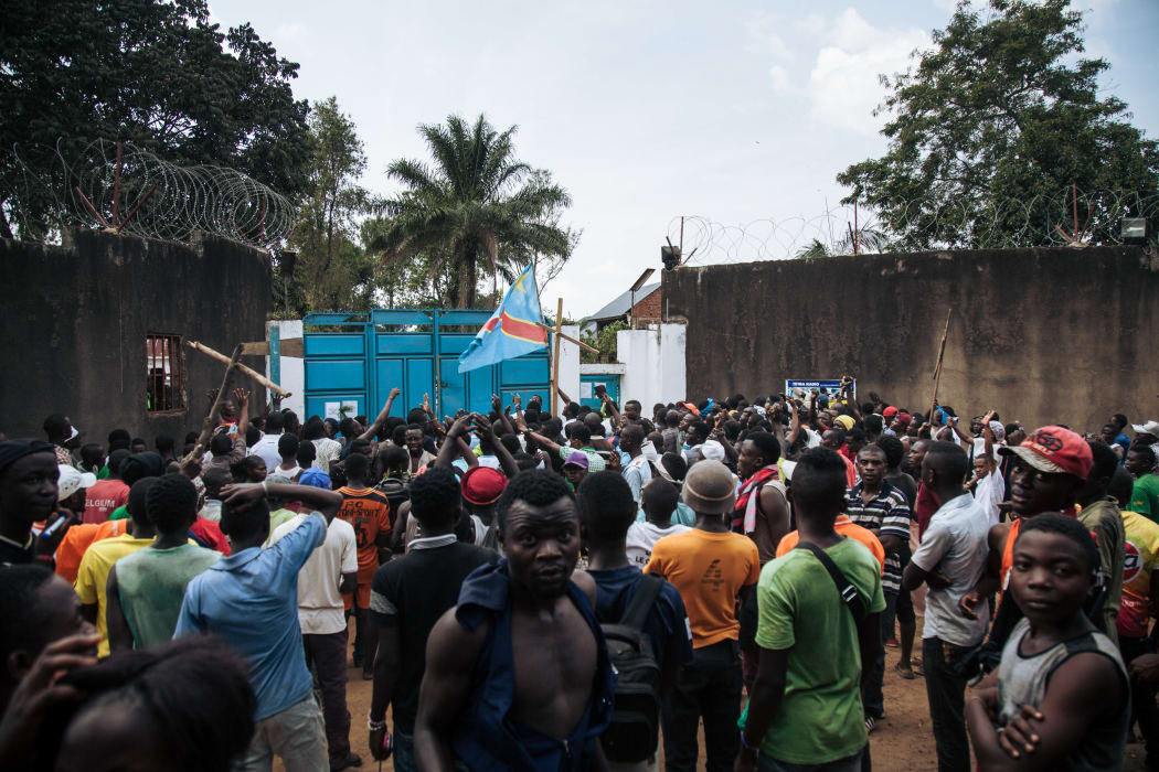 Protesters outside the Ebola response headquarter in Beni during a demonstration against the postponement of elections in the Beni territory and the city of Butembo.