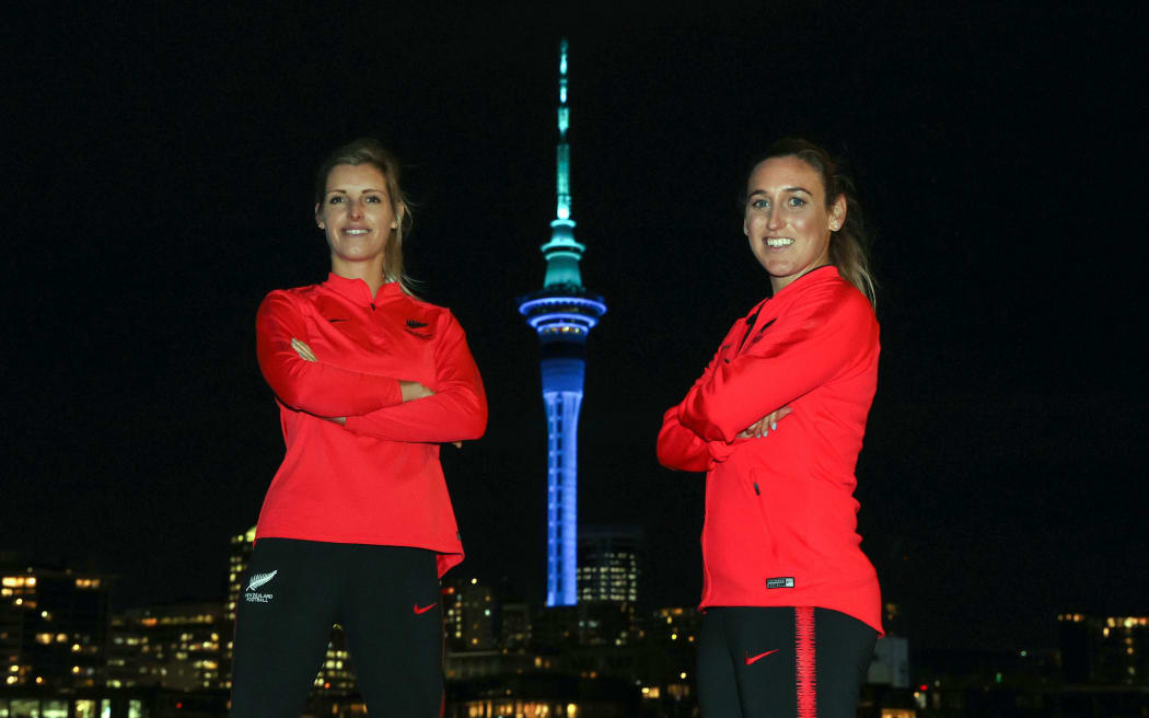 Ferns Erin Nayler and Annalie Longo pose for pictures ahead af the FIFA Women's World Cup 2023 hosting announcement. The Auckland Sky Tower lit in blue and green colours in support of the Australia / New Zealand Women's World Cup Bid, Viaduct.