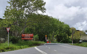 Sign showing access blocked to Te Henga Road