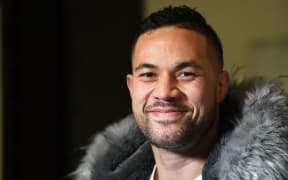 New Zealand heavyweight boxer Joseph Parker smiles during a press conference.