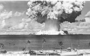 The "Baker" underwater nuclear weapons test at Bikini Atoll in 1946. Dozens of World War II vessels were used as targets for this weapons test, and now lie on the atoll's lagoon floor. Photo: US Navy.