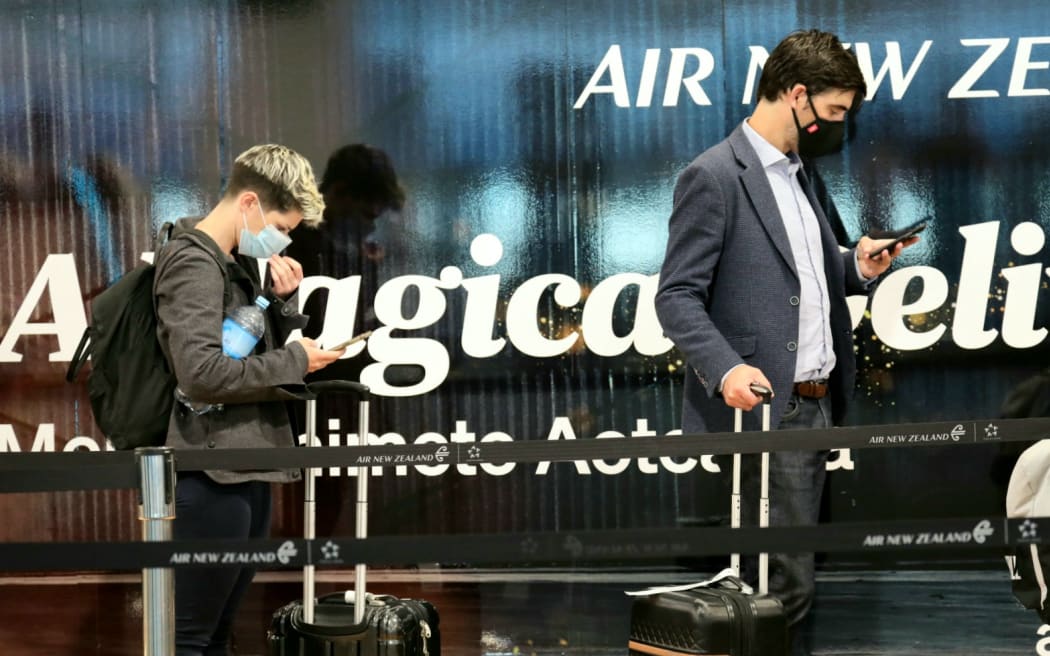 Passengers at Auckland Airport as the Covid-19 regional boundary was lifted on 15 December.