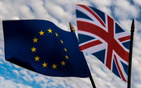 European Union and the United Kingdom flags.