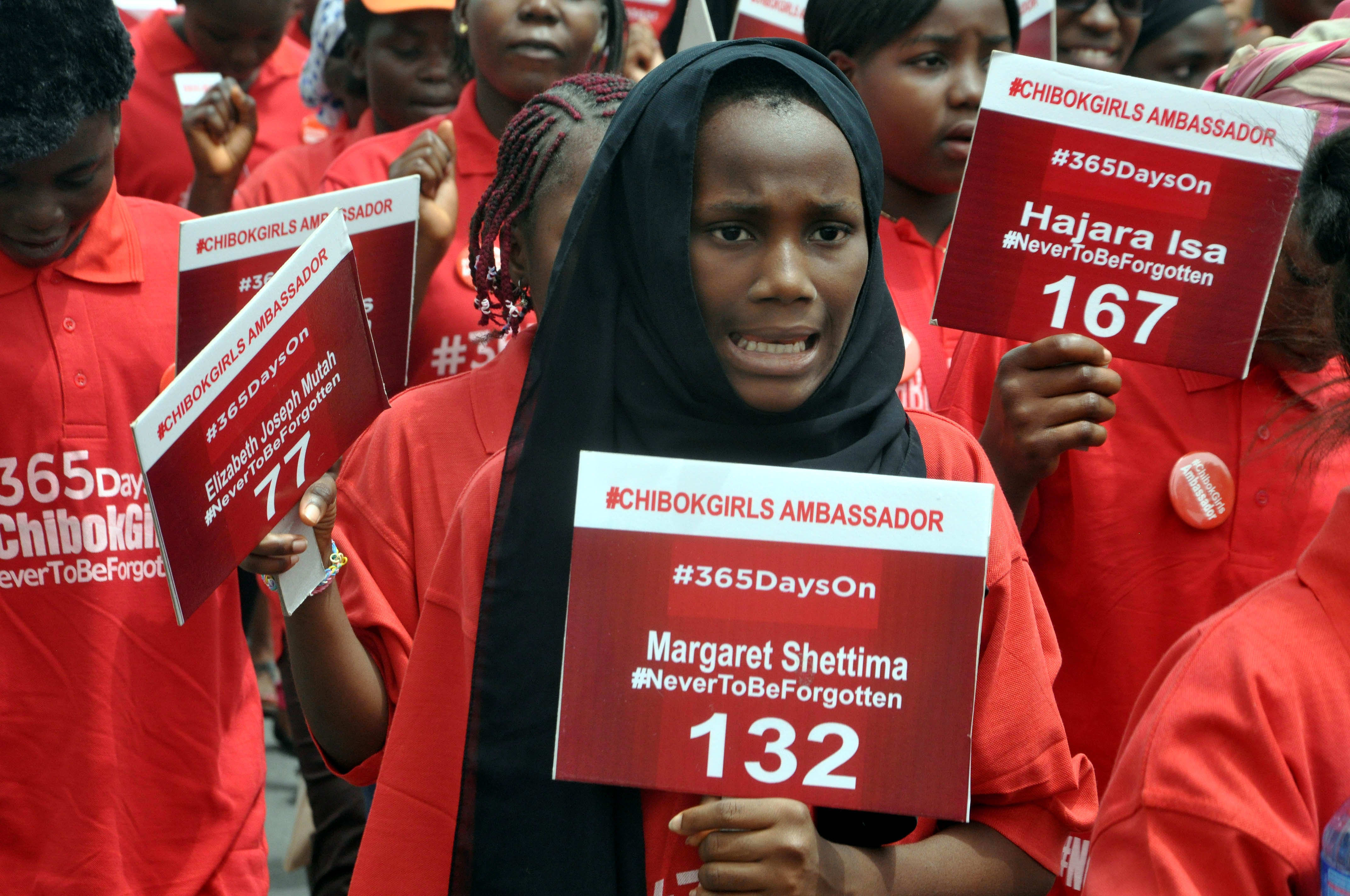 Children take part in a demonstration in Abuja on 14 April, marking one year since the abduction of 219 schoolgirls.