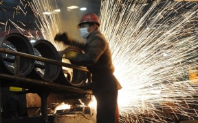 A Chinese worker at a steel mill in Hefei, in eastern China's Anhui province.