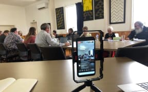 Wairarapa's district councils are using digital tools in different ways for meetings. Here, a Carterton District Council meeting is captured by smart phone.