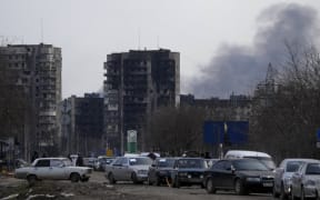 MARIUPOL, UKRAINE - MARCH 20: Civilians trapped in Mariupol city under Russian attacks, are evacuated in groups under the control of pro-Russian separatists, through other cities, in Mariupol, Ukraine on March 20, 2022.
