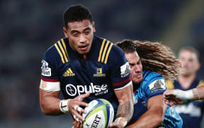 Shannon Frizell of the Highlanders is tackled by Kara Pryor of the Blues in April.