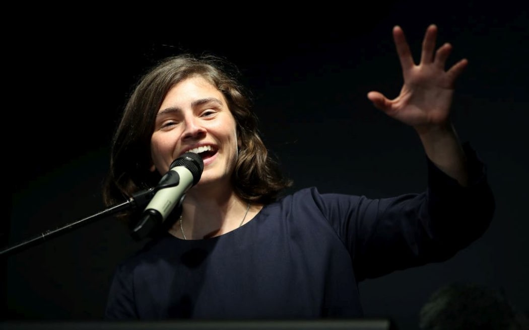 AUCKLAND, NEW ZEALAND - OCTOBER 17: Green Party Candidate for Auckland Chloe Swarbrick speaks during the Greens Party Election Function at Grid X on October 17, 2020 in Auckland, New Zealand.