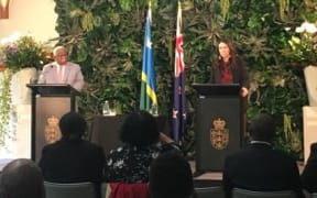 Solomon Islands PM Rick Hou, (left) and NZ PM Jacinda Ardern