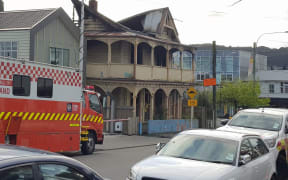 Fire crews have remained on site the morning after a fire erupted at a house on 128 Abel Smith St, Wellington.