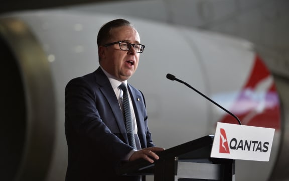 Qantas CEO Alan Joyce speaks before the last Qantas Boeing 747 airliner departs from Sydney airport to the US on July 22, 2020. The downturn in the airline industry following travel restrictions imposed by the COVID-19 outbreak forced Qantas to retire its grounded 747s after flying with the Australian carrier for almost 50 years. (Photo by PETER PARKS / AFP)