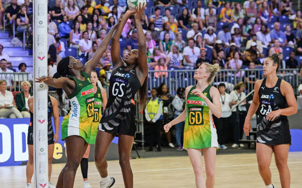 Grace Nweke of New Zealand shoots as Phumza Maweni of South Africa tries to stop her during the 2023 Netball Quad Series game between South Africa and New Zealand at the CTICC in Cape Town on 21 January 2023.