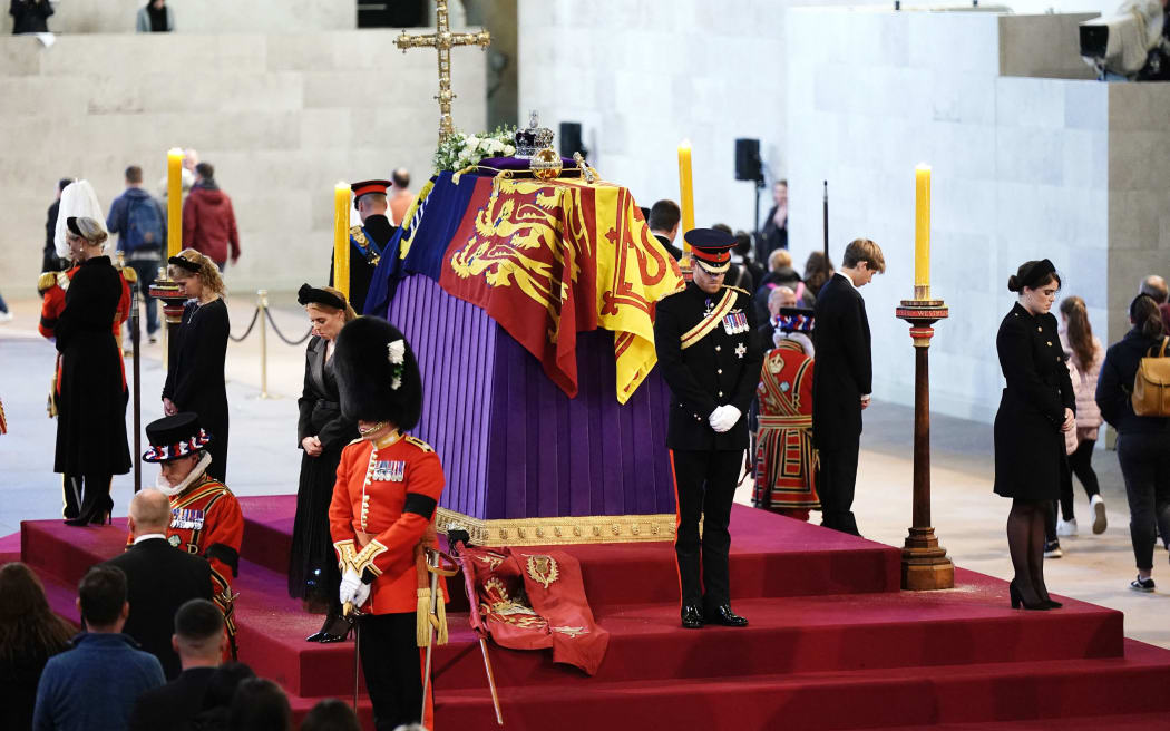 Queen Elizabeth II 's grandchildren holding vigil around the coffin of Queen Elizabeth II, draped in the Royal Standard with the Imperial State Crownin Westminster Hall on 17 September, 2022, ahead of her funeral.
