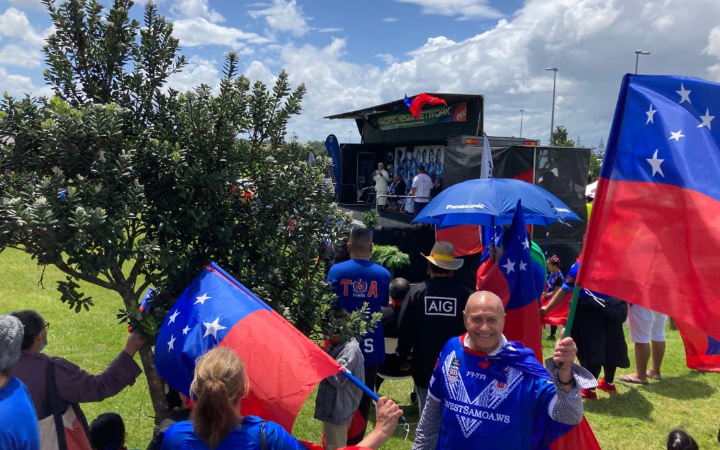 Toa Samoa fans celebrate the team being in the Rugby League World Cup final ahead of their match against Australia on 20 November.