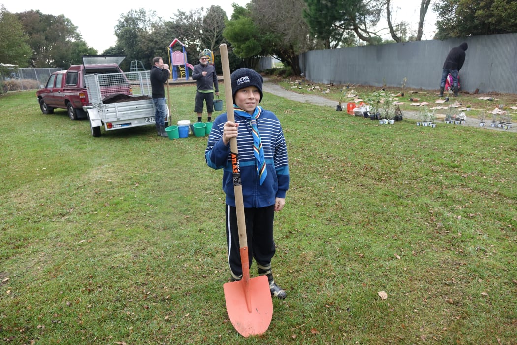 Scout Alex Neil, 10, was one of the volunteers who helped at the Greening the Redzone's planting day.