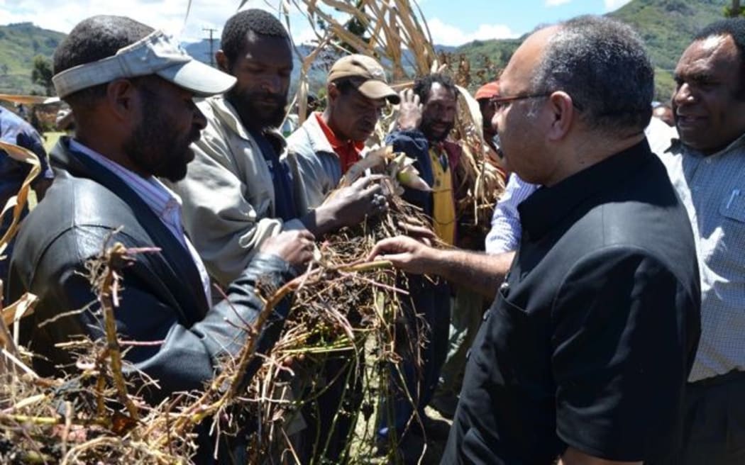 Papua New Guinea's Prime Minister Peter O'Neill meets drought-stricken farmers in the Southern Highlands