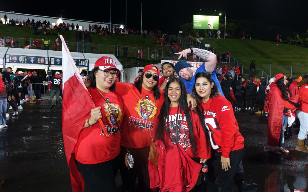 Despite some rain, Tonga fans kept up the cheer during halftime.