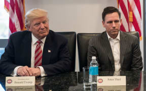 The then President-elect Donald Trump with Peter Thiel in December 2016.