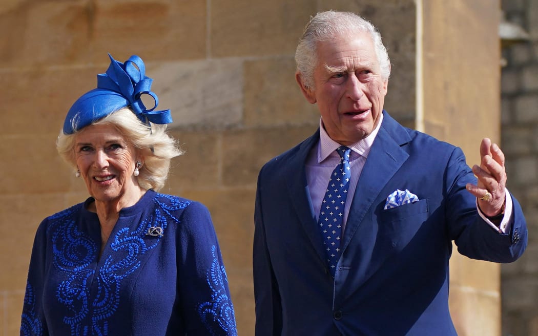 Britain's King Charles III (R) and Britain's Camilla, Queen Consort arrive for the Easter Mattins Service at St. George's Chapel, Windsor Castle on April 9, 2023. (Photo by Yui Mok / POOL / AFP)