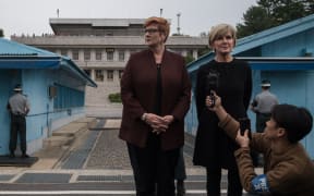 Australia's foreign minister Julie Bishop (right) and defence minister Marise Payne stand on the southern side of the military demarcation line between North and South Korea