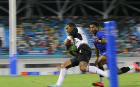 Leading from the front - Fiji 7s captain, Suliano Volivolituevei, scores the first try for his team against Samoa in the final at the 2023 Pacific Games.