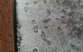 Someone with bare feet was walking in the hail and snow in central Dunedin earlier today.