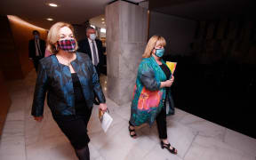National Party leader Judith Collins, left, and Housing Minister Megan Woods, walk to a joint press conference to announce a bill to amend the Resource Management Act making it easier to build houses.