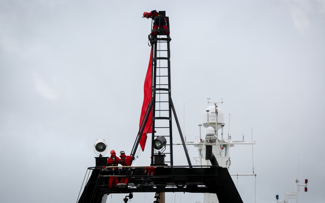Greenpeace activists on board the government research ship Tangaroa in Wellington.