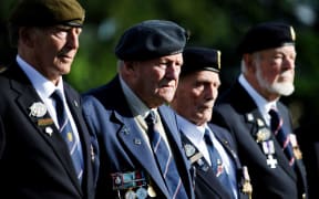 British World War II veterans visit the war cemetery of Ranville.