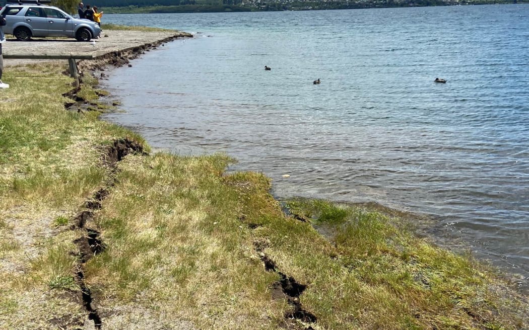 Soil cracked and slumping at the shore of Lake Taupō after the 30 November earthquake.