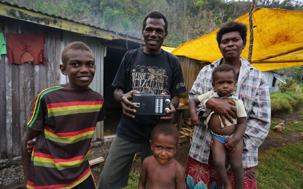 Chief Ben Lovo and his family of Bongkil Village on Erromango, Vanuatu. He says shortwave broadcasts from RNZI during Cyclone Pam allowed him to warn four villages.