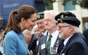 The Duchess of Cambridge greets war veterans in Blenheim.