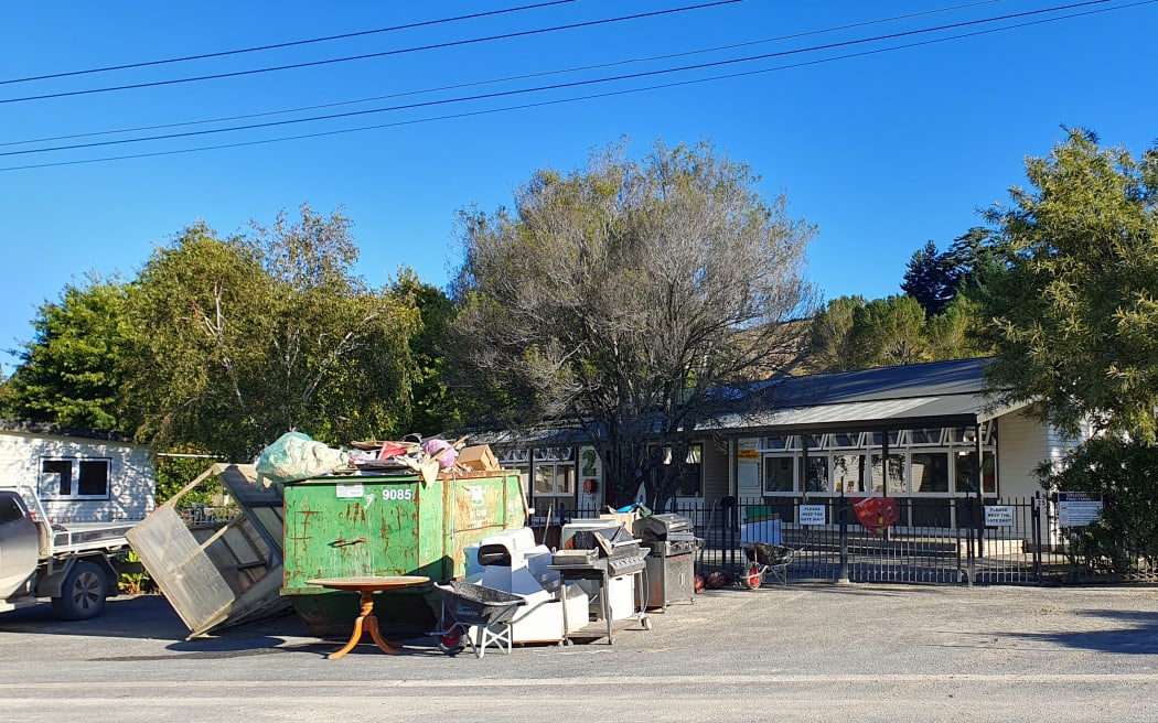 Rubbish outside Tinui school after firefighters hosed silt from classes and the field