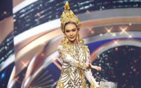 Miss Grand International contestant Han Lay taking part in the national costume part of the contest in Bangkok.