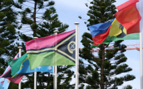 Melanesian Spearhead Group flags flown in Noumea.